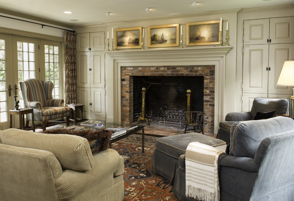 Design ideas for a country formal enclosed living room in Columbus with a standard fireplace and a brick fireplace surround.