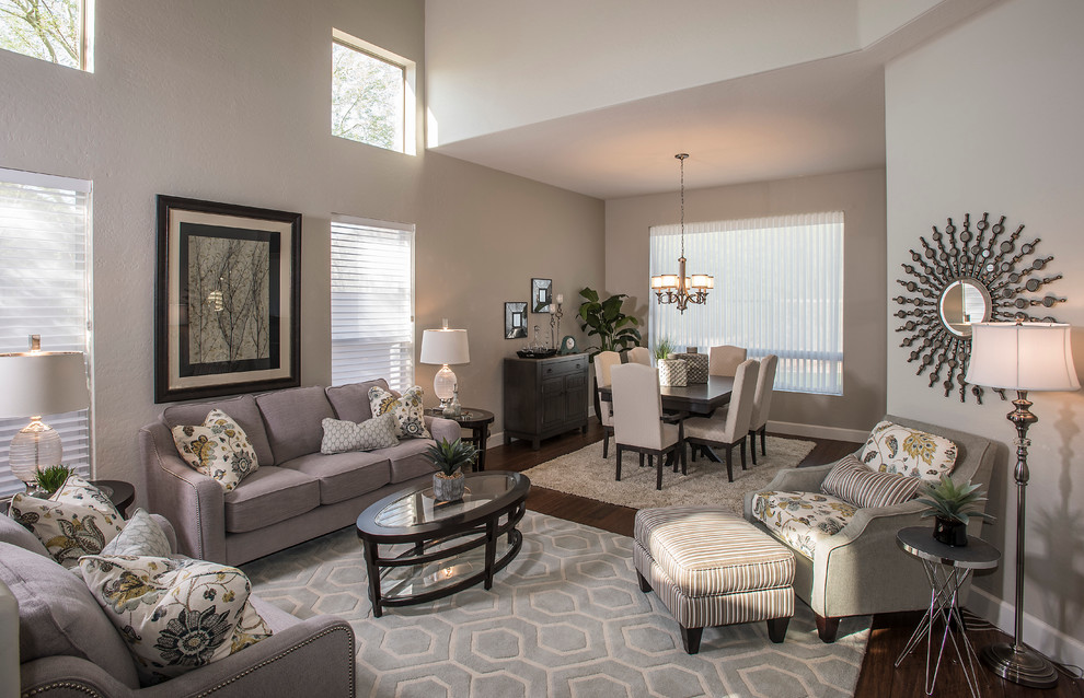 Photo of a medium sized classic living room in Phoenix with grey walls, dark hardwood flooring, no tv and feature lighting.