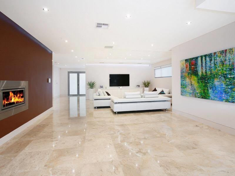 Immagine di un soggiorno contemporaneo con pavimento in marmo