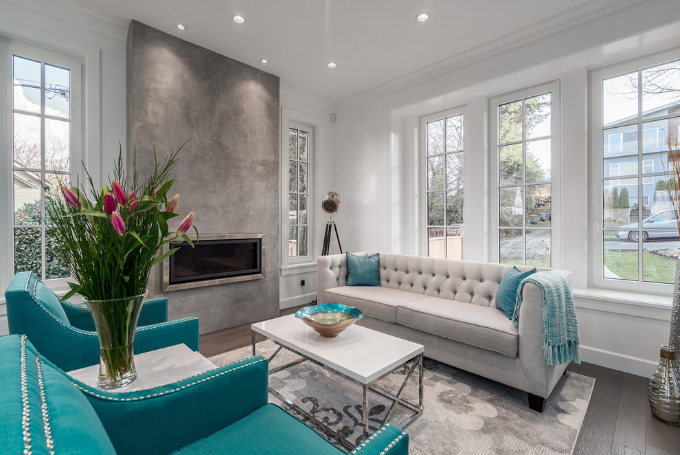Photo of a contemporary grey and teal living room in Vancouver.