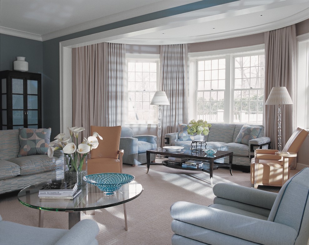 Immagine di un soggiorno contemporaneo con pareti blu e moquette