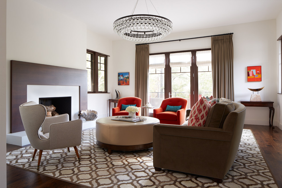 Идея дизайна: парадная, изолированная гостиная комната среднего размера в современном стиле с белыми стенами, стандартным камином, ковровым покрытием и фасадом камина из дерева без телевизора