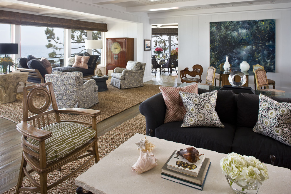 Example of a huge trendy living room design in Orange County with white walls and no tv
