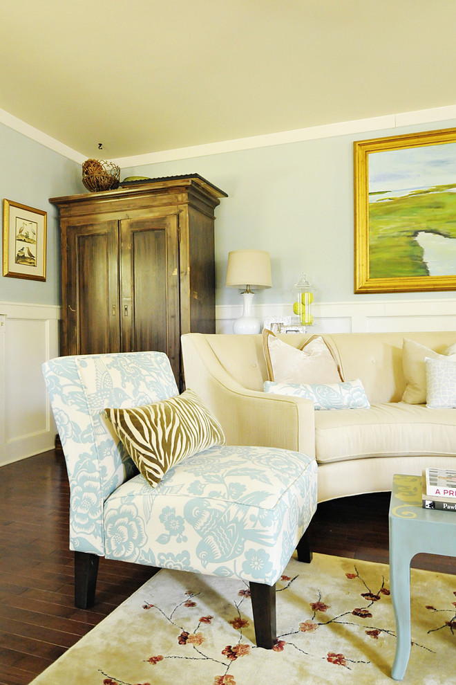 Inspiration for a timeless living room remodel in Charleston with blue walls