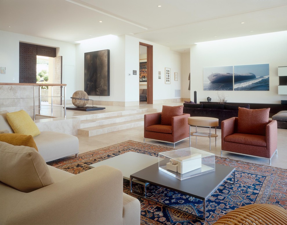 Trendy living room photo in San Diego with white walls