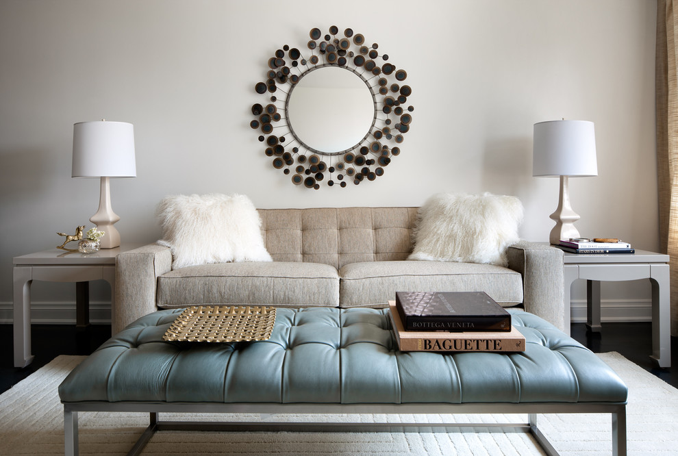 Trendy black floor living room photo in Toronto with beige walls
