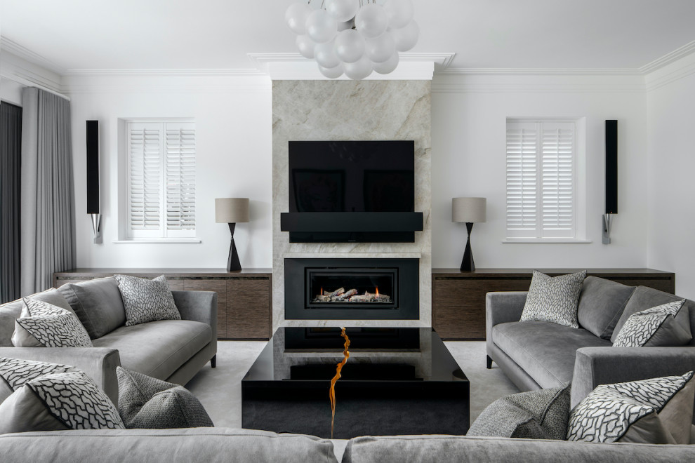Idées déco pour un grand salon contemporain avec un mur blanc, moquette, une cheminée standard, un manteau de cheminée en métal et un sol gris.