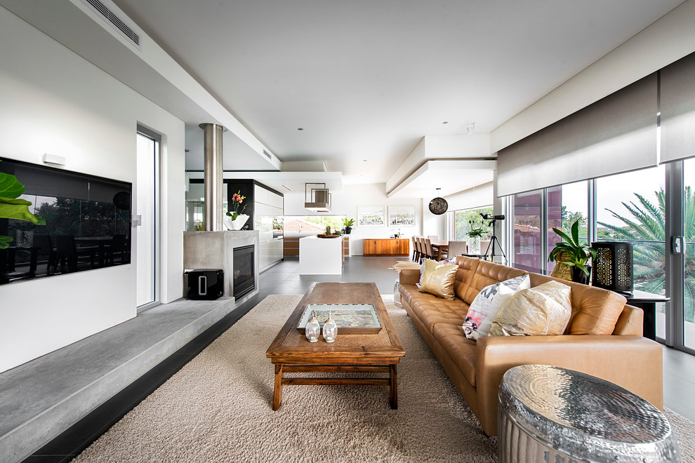 Contemporary formal open plan living room in Perth with white walls, a standard fireplace and a wall mounted tv.
