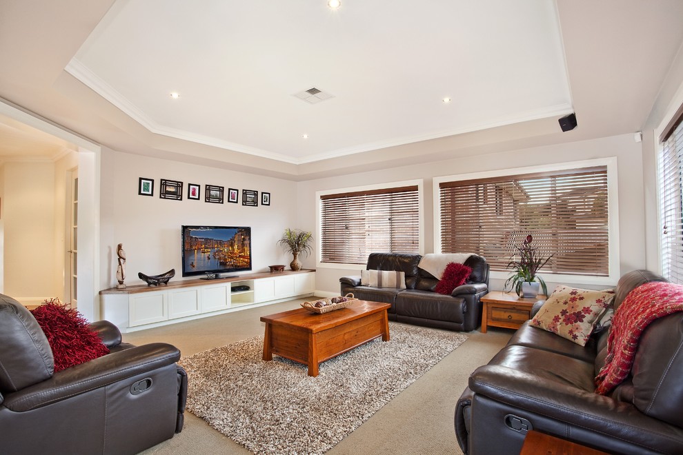 Источник вдохновения для домашнего уюта: изолированная гостиная комната среднего размера в современном стиле с серыми стенами, ковровым покрытием, серым полом и отдельно стоящим телевизором