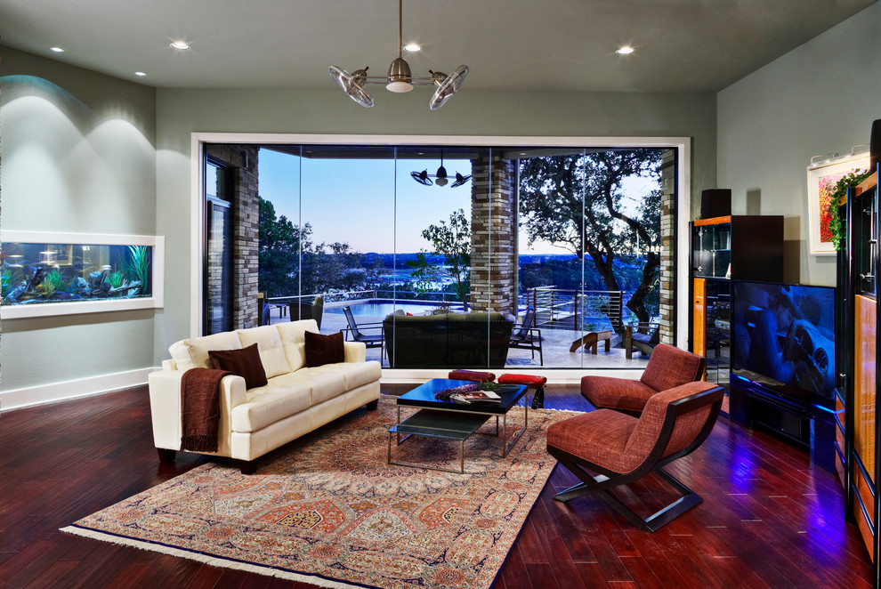 Ispirazione per un soggiorno design con pareti verdi e TV autoportante