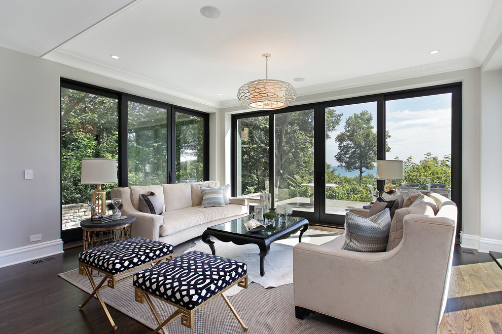 Свежая идея для дизайна: гостиная комната в современном стиле с серыми стенами и ковром на полу - отличное фото интерьера
