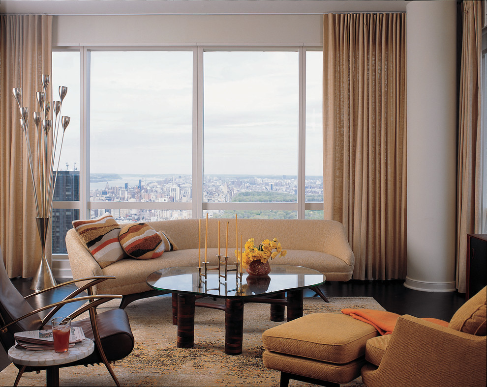 Example of a trendy living room design in New York with white walls