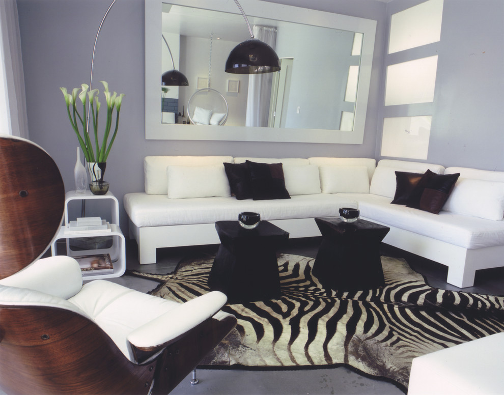 Стильный дизайн: гостиная комната среднего размера в современном стиле с синими стенами - последний тренд