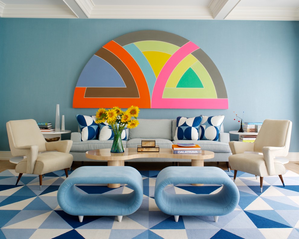 Trendy formal living room photo in New York with blue walls