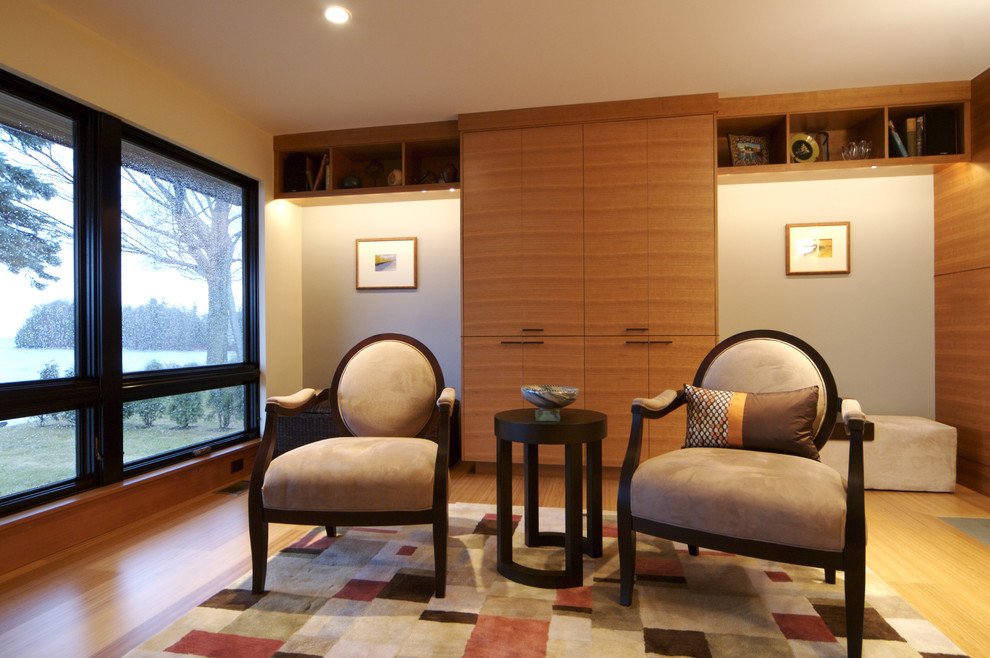 Trendy living room photo in Burlington with beige walls
