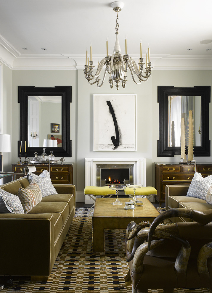 This is an example of a contemporary living room in Philadelphia with grey walls, a standard fireplace and no tv.