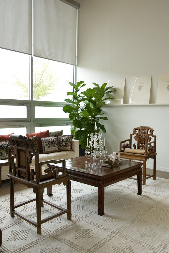 Trendy living room photo in Birmingham with white walls