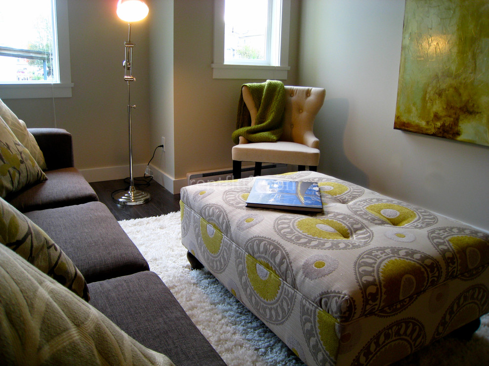 Example of a trendy living room design in Vancouver with beige walls