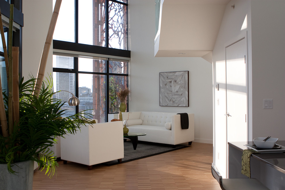 Living room - contemporary living room idea in Vancouver with white walls