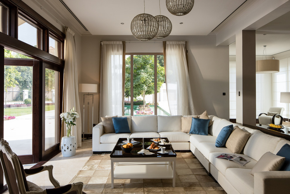 Foto di un soggiorno minimal aperto con pareti beige