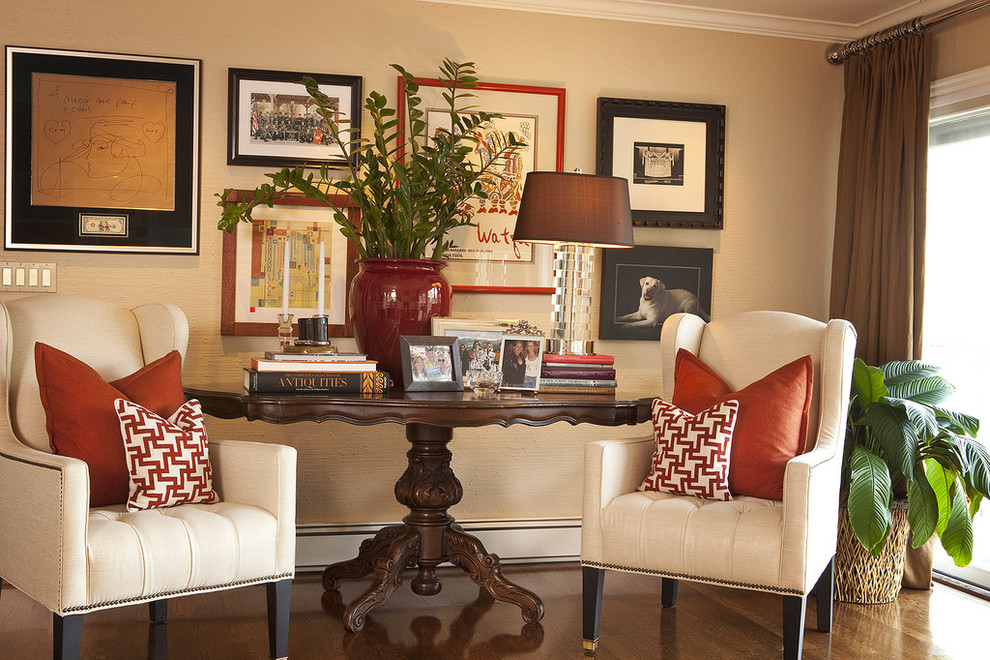 Trendy dark wood floor living room photo in Portland with beige walls