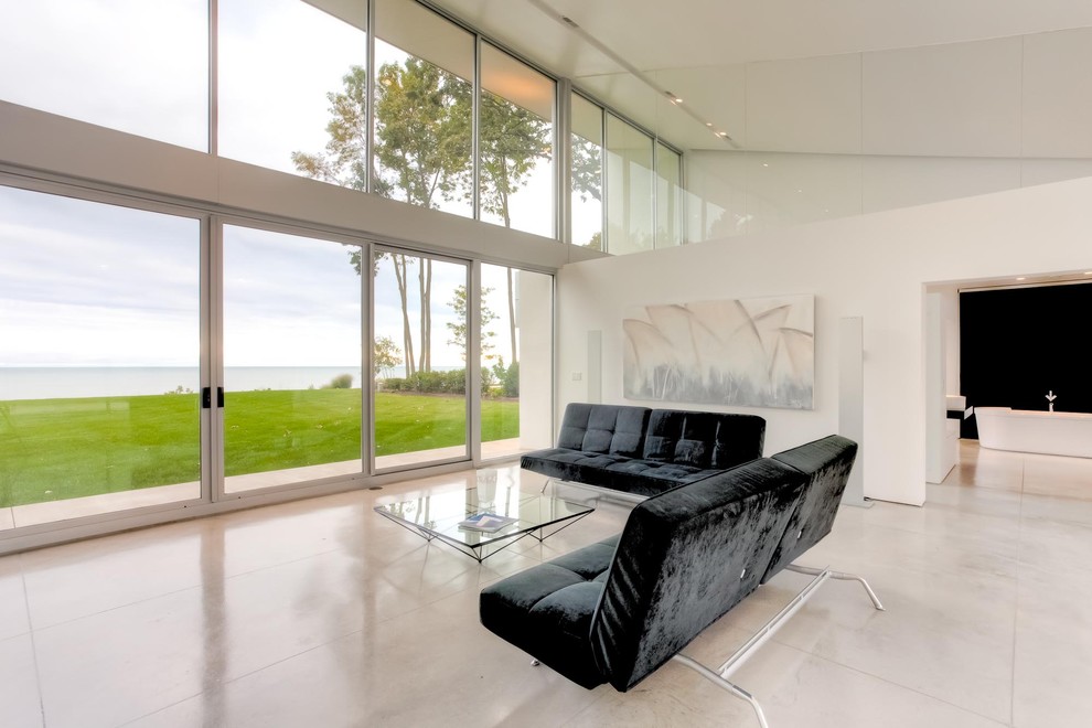 Esempio di un soggiorno design con pareti bianche