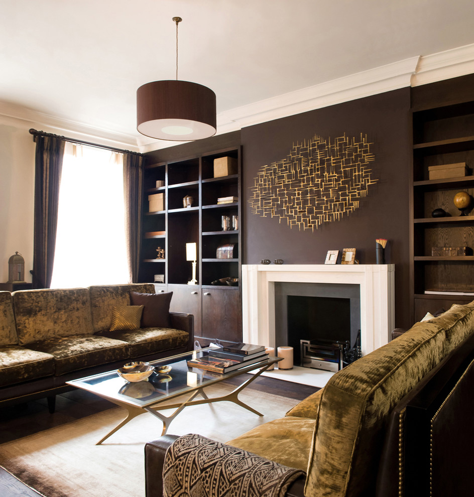Living room library - contemporary living room library idea in London with brown walls, a standard fireplace and no tv