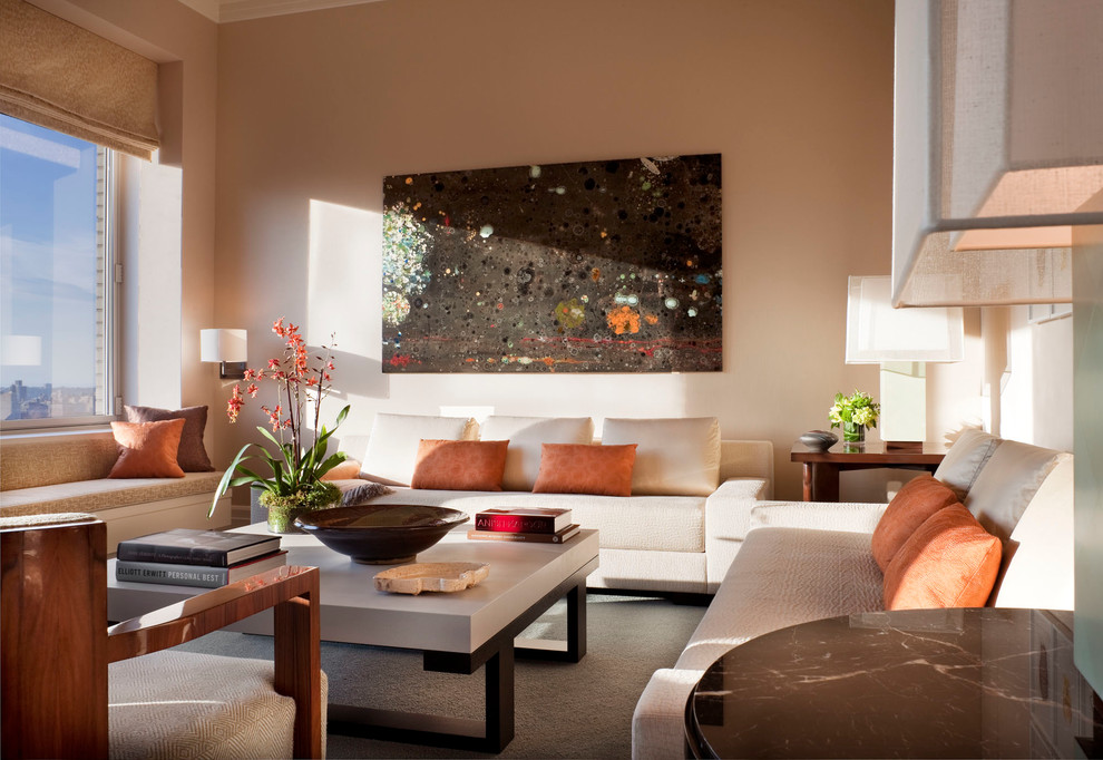 This is an example of a large contemporary living room in New York with beige walls.