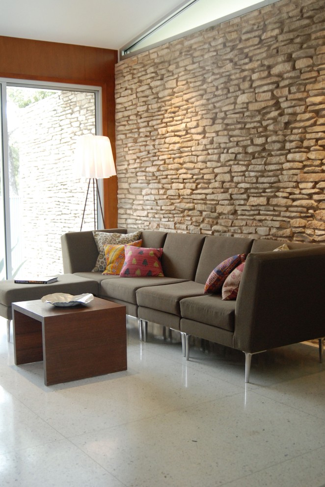 Design ideas for a contemporary living room feature wall in Other with beige walls.
