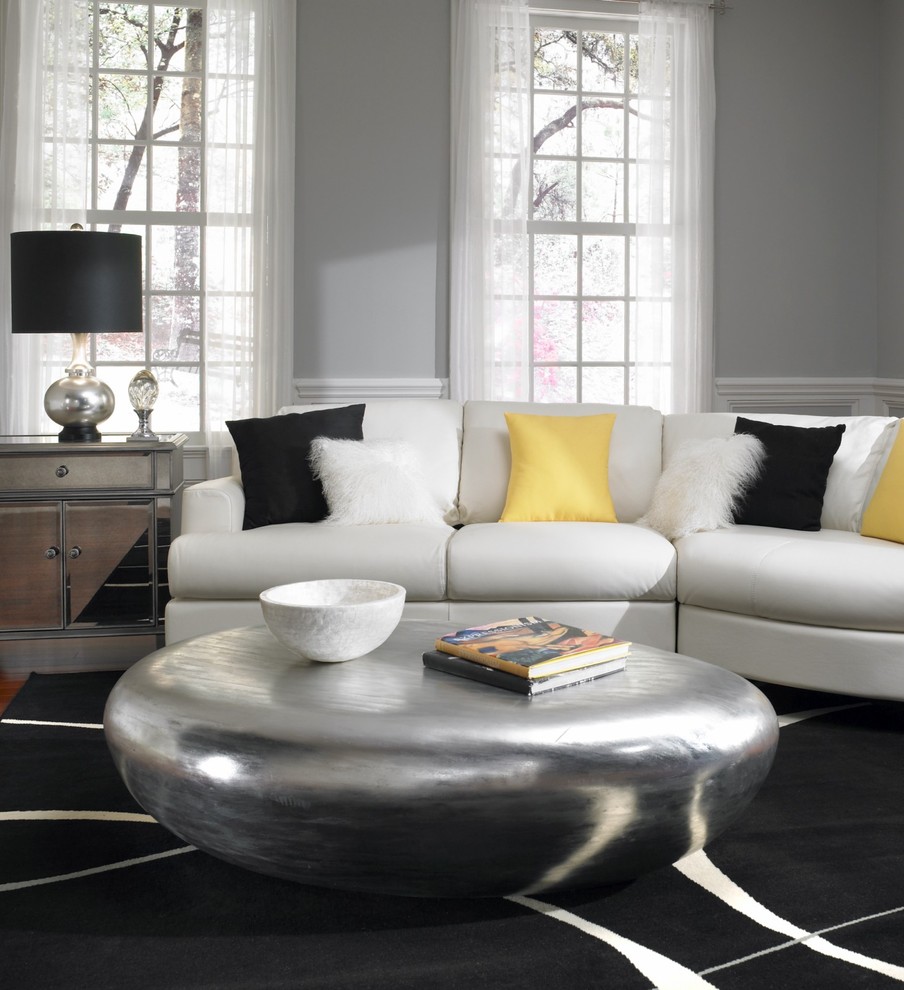 Источник вдохновения для домашнего уюта: гостиная комната в современном стиле с серыми стенами и ковром на полу