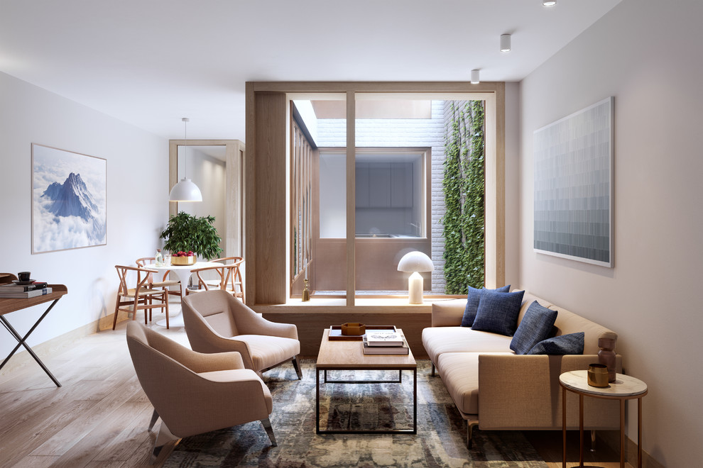 Идея дизайна: изолированная гостиная комната среднего размера в современном стиле с серыми стенами, светлым паркетным полом и бежевым полом