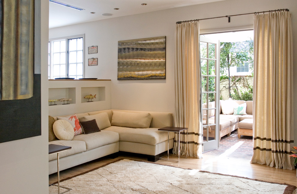 Living room - mid-sized contemporary medium tone wood floor living room idea in Los Angeles