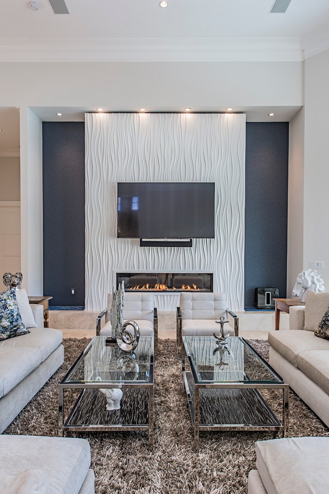 Inspiration for a contemporary living room remodel in Tampa with blue walls, a ribbon fireplace and a wall-mounted tv