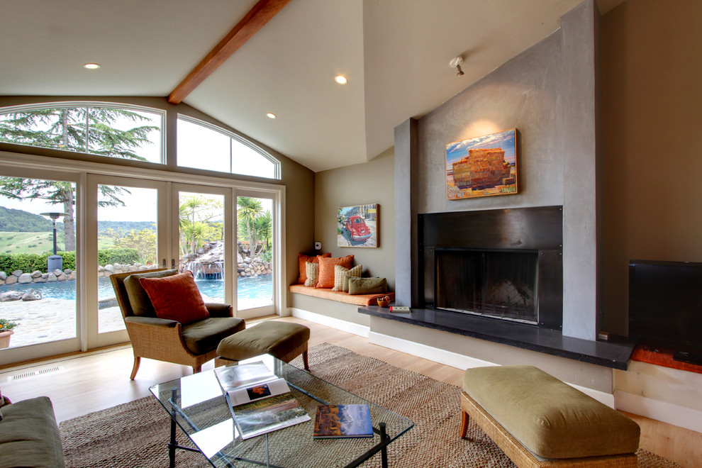 Large transitional living room photo in San Francisco with a standard fireplace
