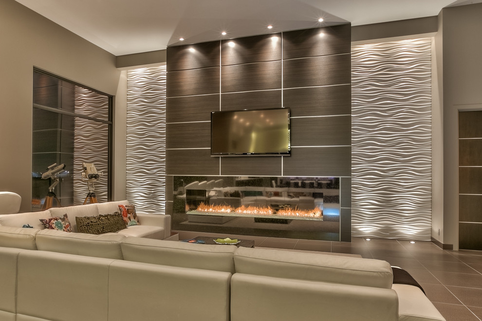 Design ideas for an expansive contemporary open plan living room in Omaha with grey walls, a ribbon fireplace, a wall mounted tv, a home bar, a metal fireplace surround and brown floors.