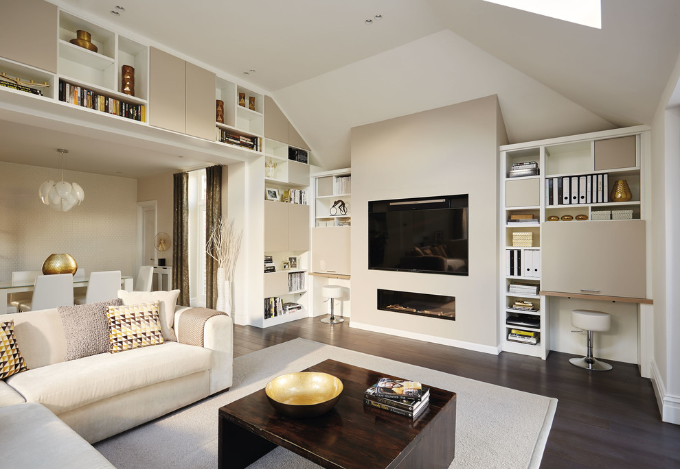 This is an example of an expansive contemporary living room in Manchester with white walls, dark hardwood flooring, a ribbon fireplace, a built-in media unit and brown floors.