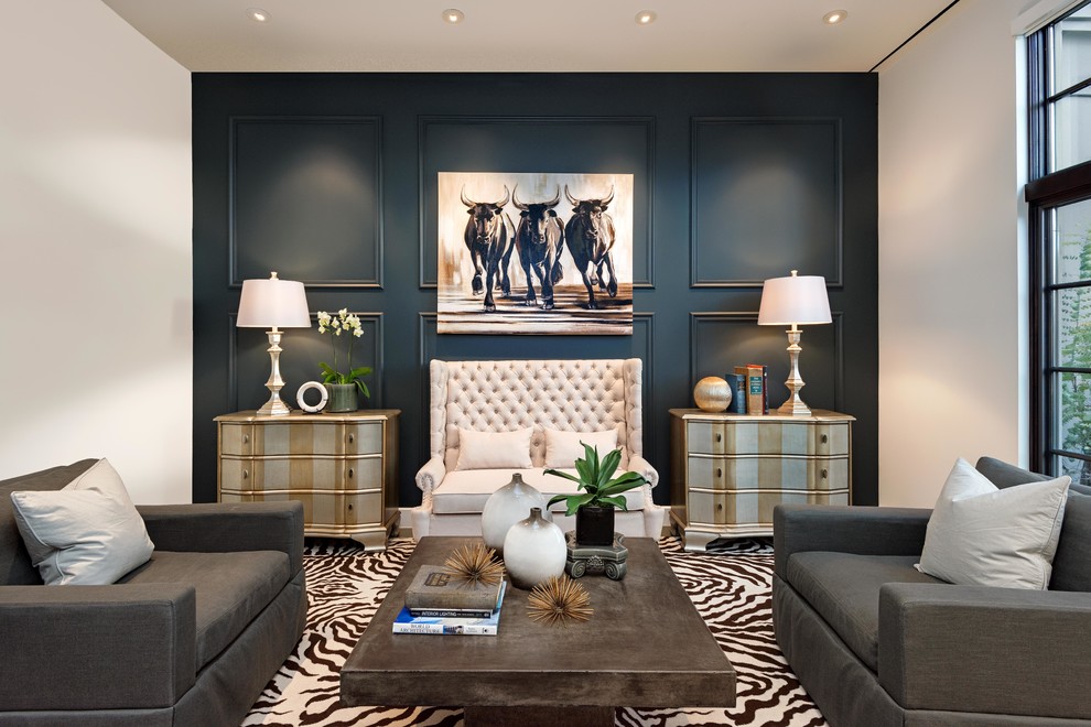 Photo of a large classic formal living room feature wall in Phoenix with blue walls, concrete flooring and grey floors.