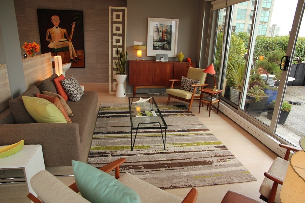 Immagine di un soggiorno moderno di medie dimensioni con pareti grigie