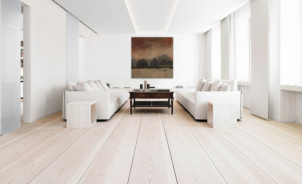 Inspiration for a medium sized modern formal enclosed living room in Salt Lake City with white walls and light hardwood flooring.