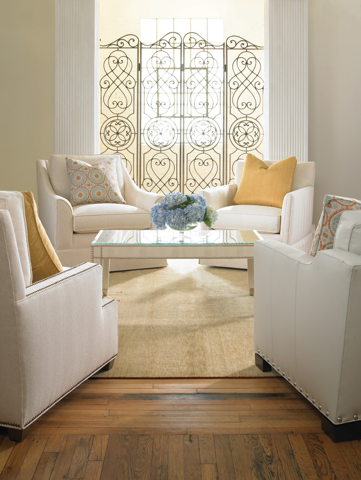 Example of a mid-sized transitional formal and enclosed medium tone wood floor living room design in Orange County with beige walls