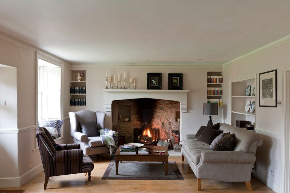 Example of a mid-sized farmhouse living room design in London