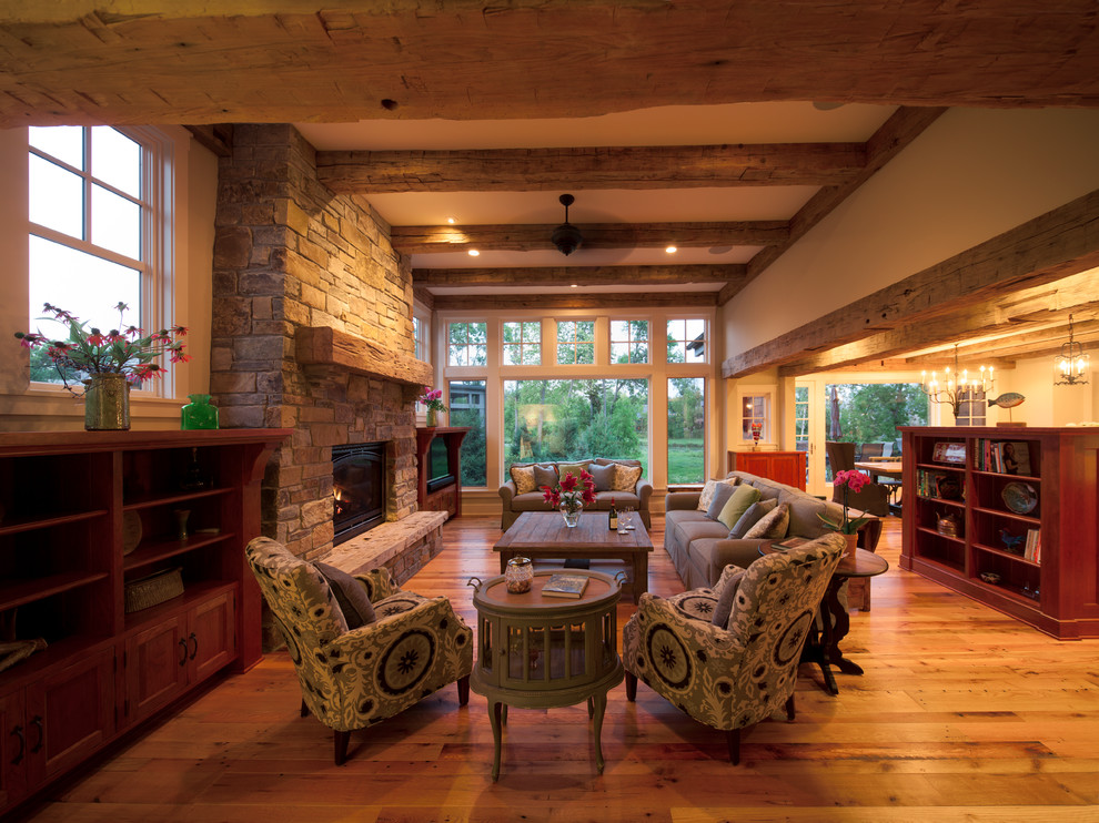 Photo of a rustic open plan living room in Minneapolis.