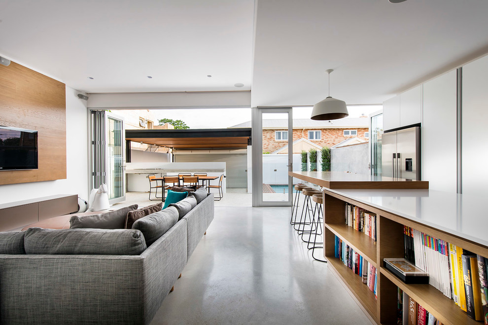 Photo of a contemporary formal open plan living room in Perth with white walls and a wall mounted tv.