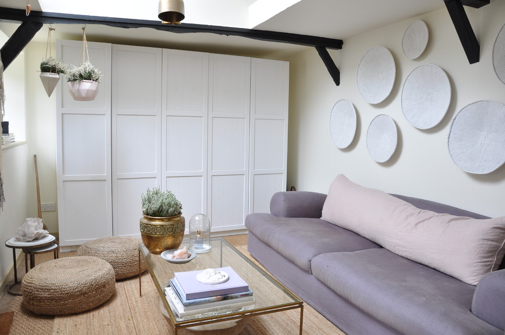 Photo of a nautical living room in London with beige walls.