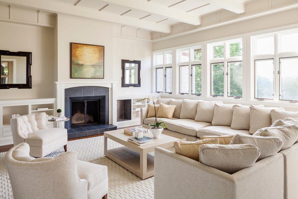 This is an example of a large contemporary formal open plan living room in Other with beige walls, dark hardwood flooring, a standard fireplace, a tiled fireplace surround and no tv.