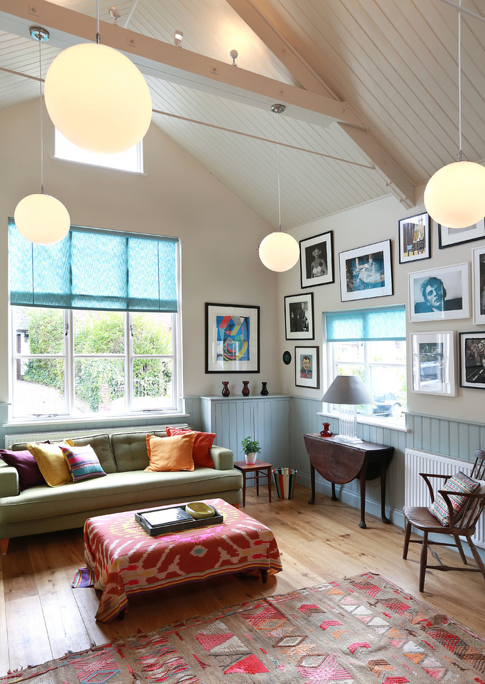 Design ideas for a scandi living room in London with feature lighting.