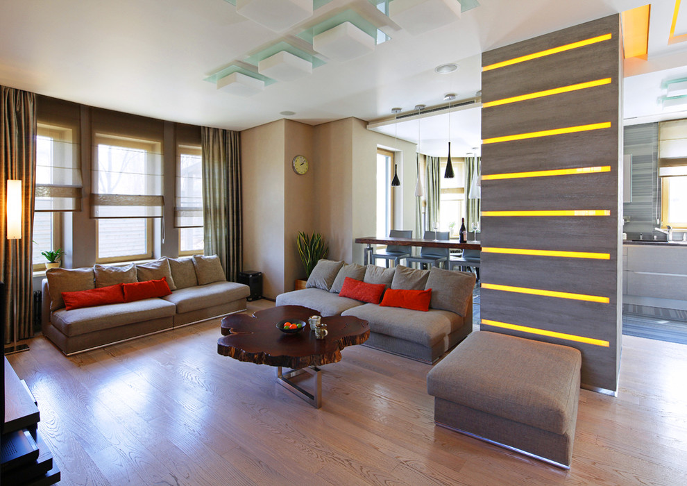Inspiration för mellanstora moderna vardagsrum, med beige väggar
