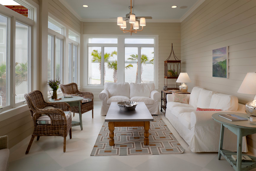 На фото: открытая гостиная комната среднего размера в морском стиле с белыми стенами и полом из линолеума без камина, телевизора
