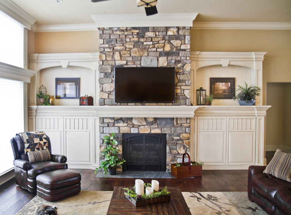 Inspiration for a large classic open plan living room in Other with beige walls, dark hardwood flooring, a standard fireplace, a stone fireplace surround and a wall mounted tv.