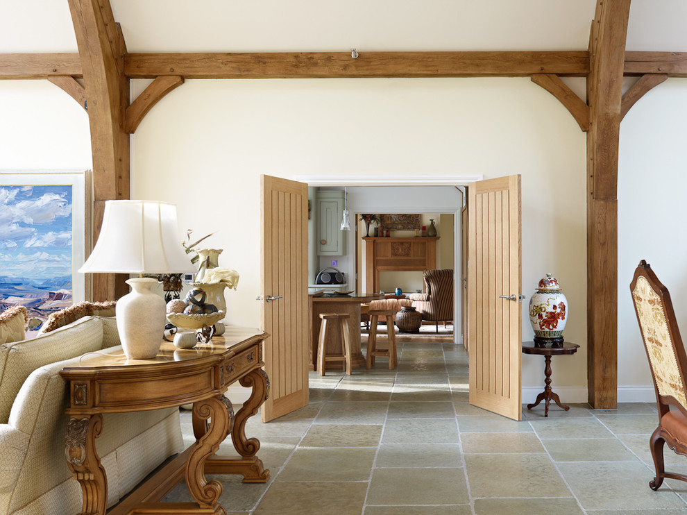 Example of a mid-sized farmhouse open concept living room design in Surrey